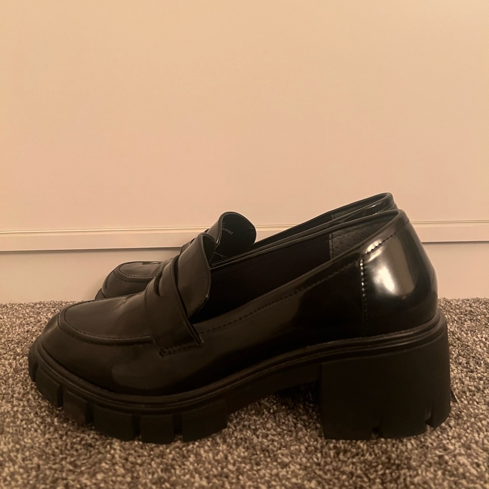 Black leather loafers